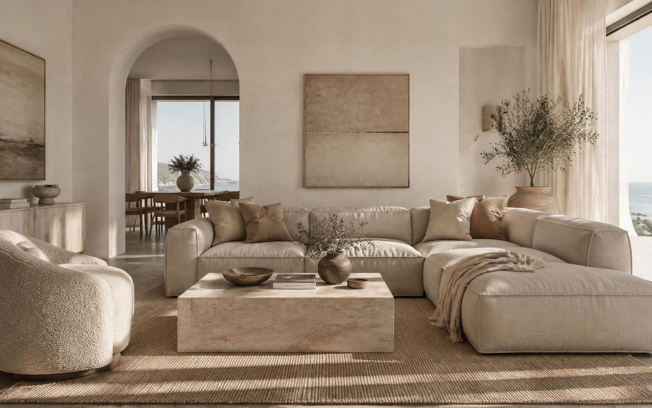 Warm neutral coastal living room designed by Catherine Jean